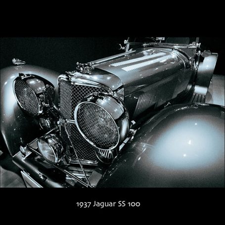 1937 Jaguar SS 100 sports car, showcasing its sleek curves and vintage design.