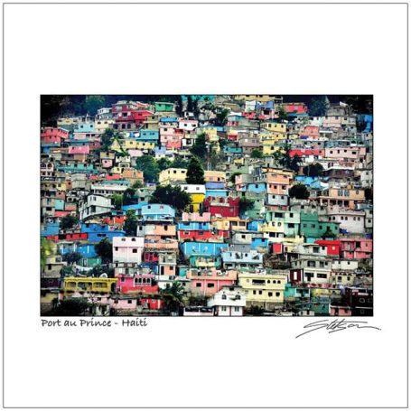 Colourful houses densely packed on hillside in Port-au-Prince, Haiti.
