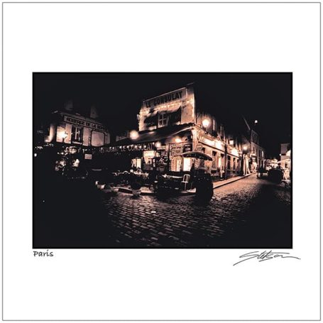 A dimly lit street scene featuring a café with warm lights at night.