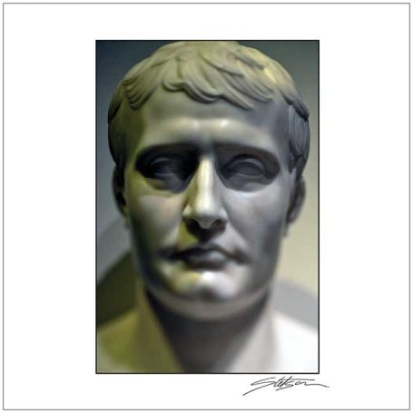 Bust of a man with short hair and a neutral expression, resembling a historical figure.