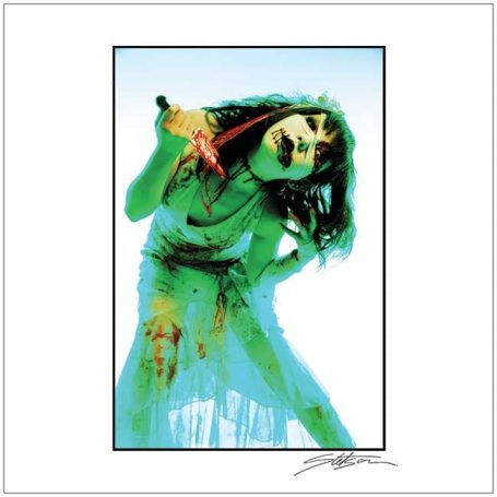 A woman in a blood-stained dress poses menacingly with a bloody knife.