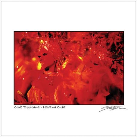 Abstract red texture with swirling patterns and hints of yellow highlights.