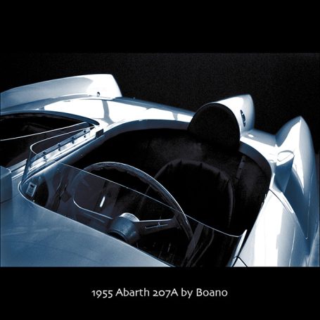1955 Abarth 2000 racing car, showcasing a sleek, streamlined design and exposed cockpit.