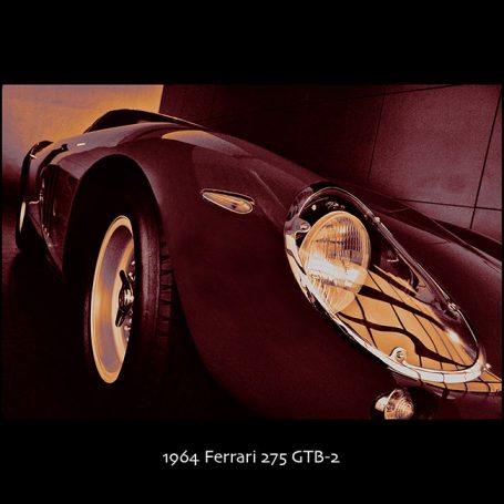 1964 Ferrari 275 GTB-2 in a dramatic angled view, showcasing its sleek design.