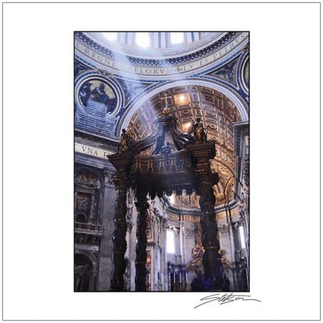 Interior of a grand church with light beams illuminating ornate architecture.